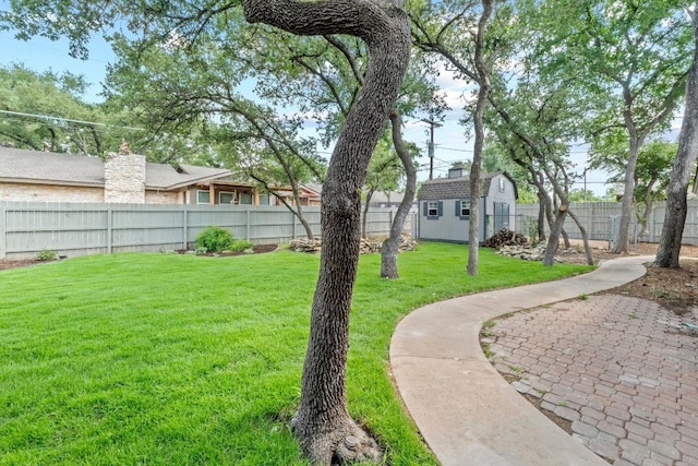 801 Lime Rock Dr, Round Rock, TX 78681 - fenced backyard featuring a storage unit