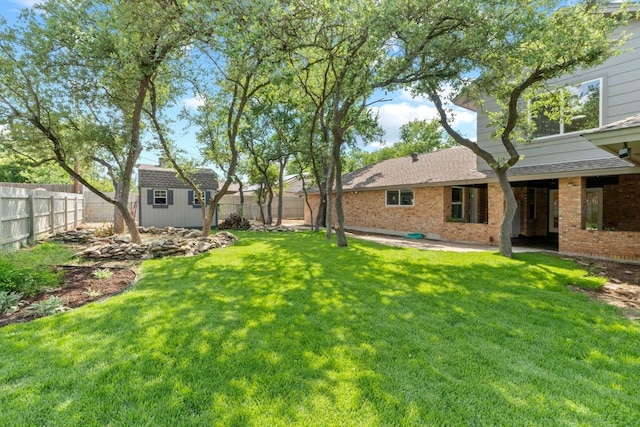 801 Lime Rock Dr, Round Rock, TX 78681 - fenced backyard with a storage unit