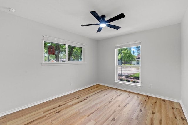 801 Lime Rock Dr, Round Rock, TX 78681 - unfurnished room with wood finished floors and ceiling fan