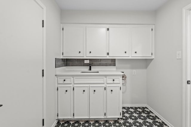 801 Lime Rock Dr, Round Rock, TX 78681 - washroom featuring dark flooring and a sink