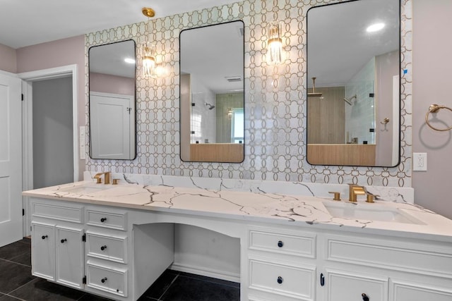 801 Lime Rock Dr, Round Rock, TX 78681 - bathroom featuring double vanity, tile patterned flooring, and a shower