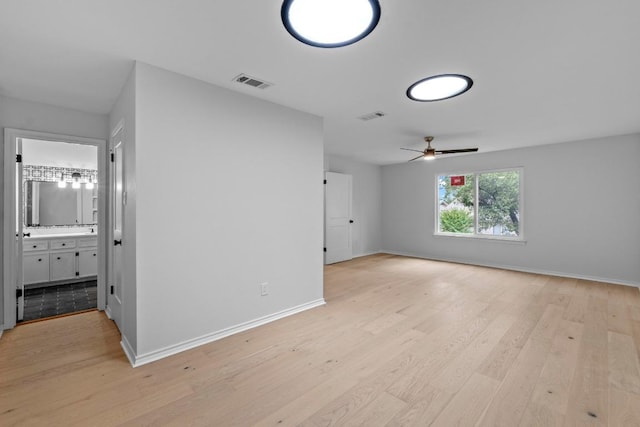 801 Lime Rock Dr, Round Rock, TX 78681 - empty room featuring light wood-style flooring and a ceiling fan