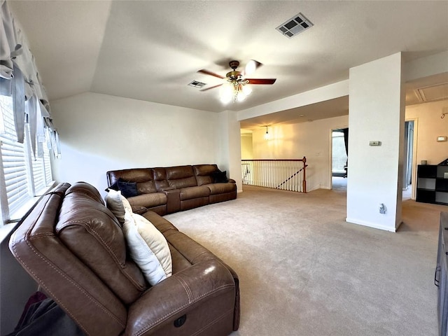 404 Autumn Trl, Georgetown, TX 78626 - carpeted living area featuring attic access, a ceiling fan, plenty of natural light, and vaulted ceiling