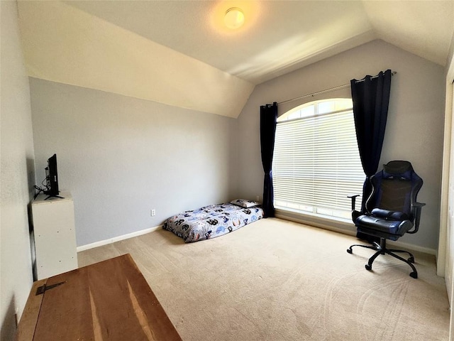 404 Autumn Trl, Georgetown, TX 78626 - carpeted bedroom featuring vaulted ceiling and baseboards
