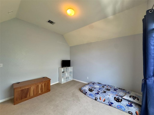 404 Autumn Trl, Georgetown, TX 78626 - unfurnished bedroom featuring lofted ceiling, carpet flooring, and baseboards