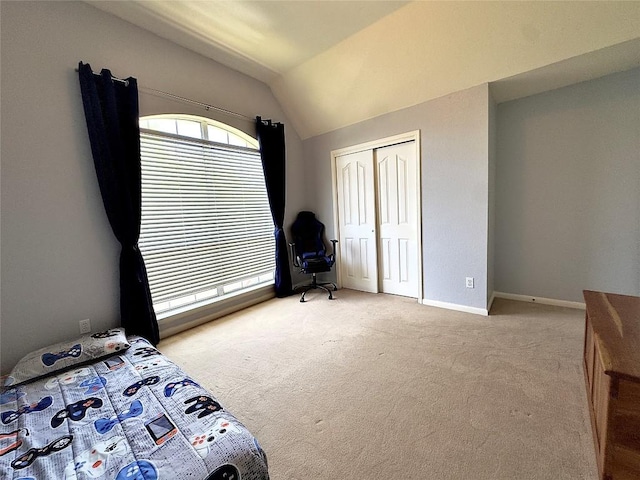 404 Autumn Trl, Georgetown, TX 78626 - bedroom with vaulted ceiling, light colored carpet, a closet, and baseboards