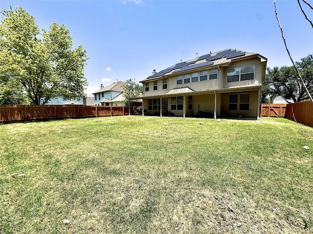 404 Autumn Trl, Georgetown, TX 78626 - back of house featuring roof mounted solar panels