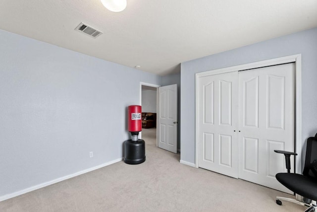 404 Autumn Trl, Georgetown, TX 78626 - unfurnished bedroom featuring light carpet and a closet