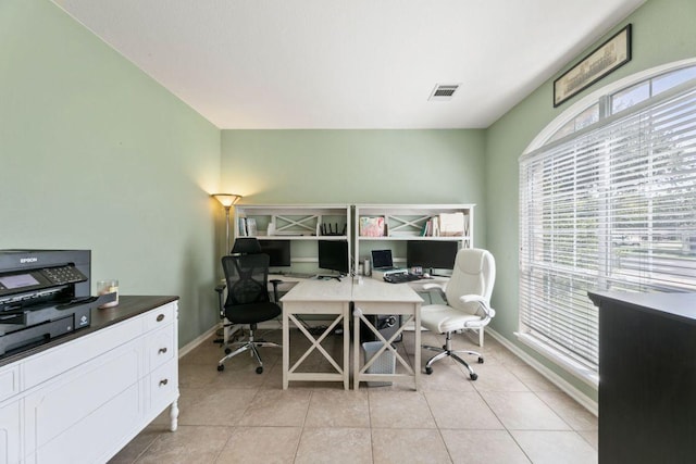 404 Autumn Trl, Georgetown, TX 78626 - office area with baseboards and light tile patterned flooring