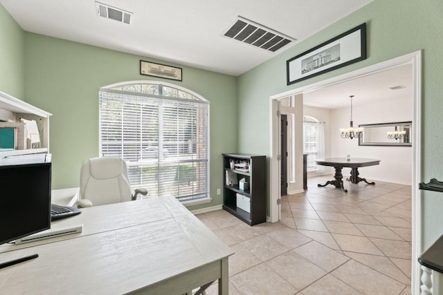 404 Autumn Trl, Georgetown, TX 78626 - home office with a chandelier and light tile patterned floors