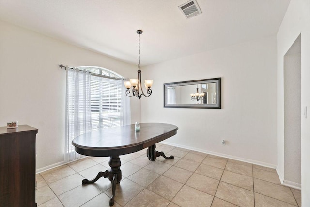 404 Autumn Trl, Georgetown, TX 78626 - dining room with a chandelier and light tile patterned floors