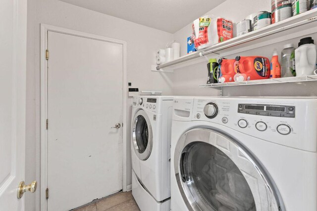 404 Autumn Trl, Georgetown, TX 78626 - laundry room featuring independent washer and dryer and light tile patterned floors