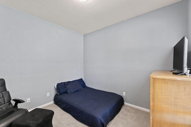 404 Autumn Trl, Georgetown, TX 78626 - carpeted bedroom featuring baseboards