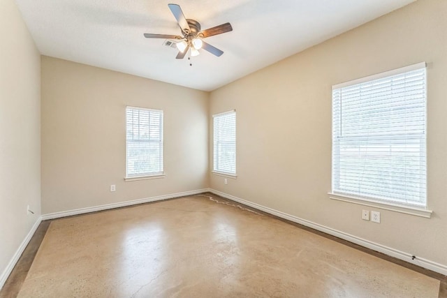 518 Clear Creek Ln, Dripping Springs, TX 78620 - unfurnished room featuring ceiling fan, baseboards, and finished concrete flooring