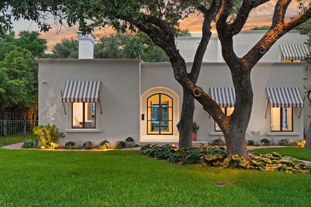 4622 Lake View Dr, Austin, TX 78731 - view of front facade with stucco siding and a chimney