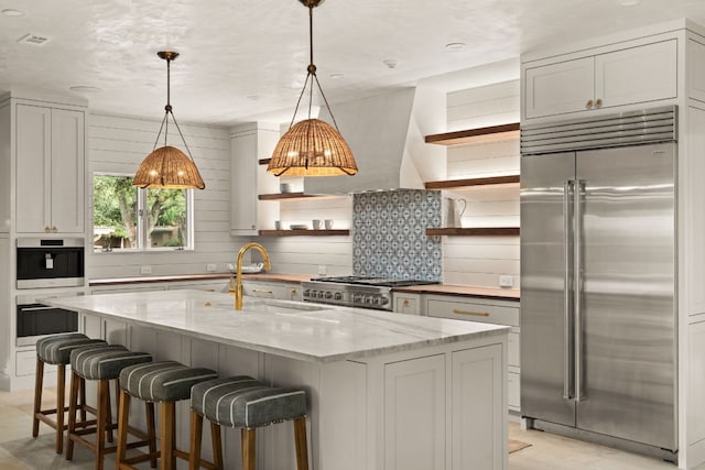 4622 Lake View Dr, Austin, TX 78731 - kitchen featuring stainless steel built in fridge, open shelves, a sink, stove, and light stone countertops