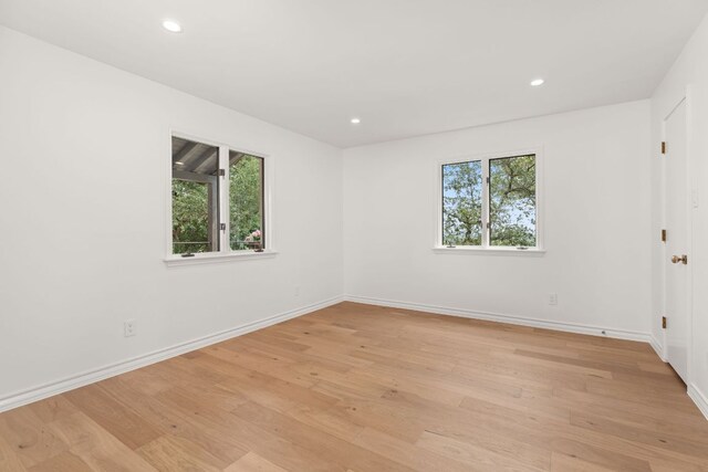 4622 Lake View Dr, Austin, TX 78731 - empty room featuring baseboards, light wood-type flooring, and recessed lighting