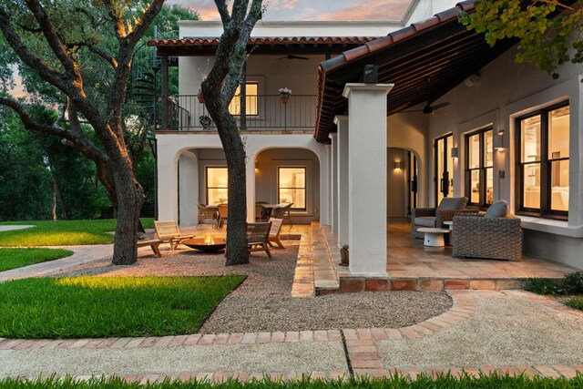 4622 Lake View Dr, Austin, TX 78731 - back of house featuring a ceiling fan, a balcony, and stucco siding