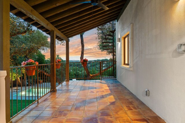4622 Lake View Dr, Austin, TX 78731 - patio terrace at dusk featuring a ceiling fan and a patio area