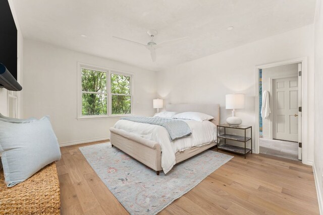 4622 Lake View Dr, Austin, TX 78731 - bedroom with light wood-type flooring, baseboards, and ceiling fan