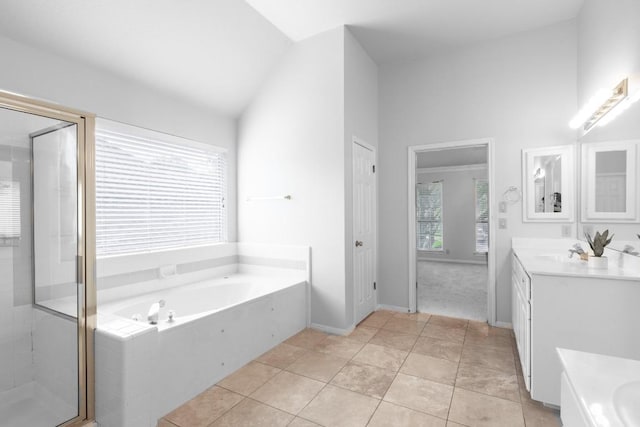 10701 Redmond Rd, Austin, TX 78739 - full bath featuring vanity, a bath, a shower stall, and lofted ceiling