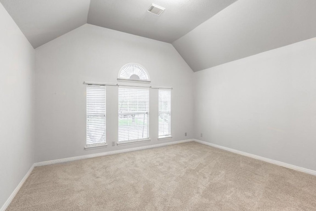 10701 Redmond Rd, Austin, TX 78739 - unfurnished room featuring carpet floors and lofted ceiling