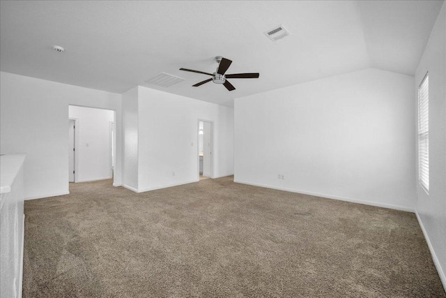 1013 S San Marcos St, Manor, TX 78653 - carpeted spare room featuring ceiling fan and lofted ceiling