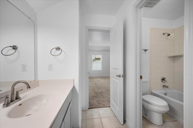 1013 S San Marcos St, Manor, TX 78653 - bathroom featuring vanity, tile patterned flooring, and shower / washtub combination