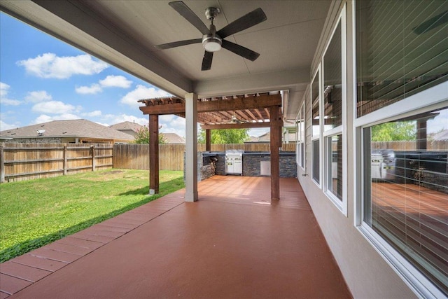 1013 S San Marcos St, Manor, TX 78653 - fenced backyard with ceiling fan, area for grilling, and a patio area