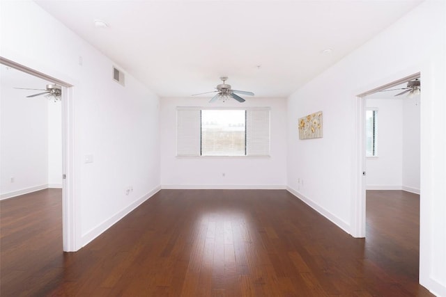 3016 Guadalupe St Unit 202, Austin, TX 78705 - empty room featuring ceiling fan, plenty of natural light, wood finished floors, and baseboards