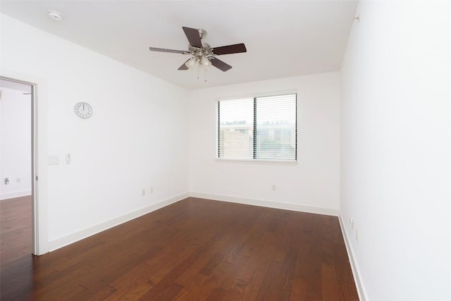 3016 Guadalupe St Unit 202, Austin, TX 78705 - spare room with dark wood-style flooring, a ceiling fan, baseboards, and a smoke detector