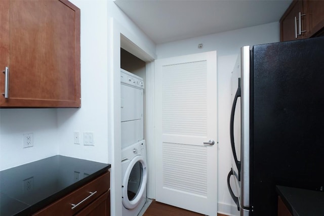3016 Guadalupe St Unit 202, Austin, TX 78705 - washroom featuring estacked washer and dryer