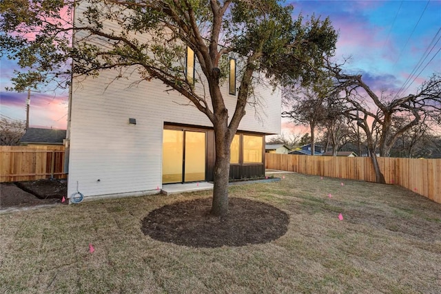 1804 Sylvan Dr, Austin, TX 78741 - view of back of property at dusk