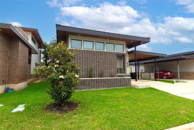 420 Starlight Village Loop Unit 17, Leander, TX 78641 - view of front facade with a front yard