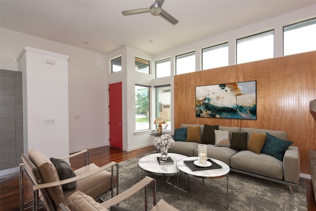420 Starlight Village Loop Unit 17, Leander, TX 78641 - living area featuring a ceiling fan, wood finished floors, and baseboards