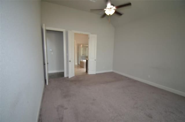 121 Bright Valley Way, Austin, TX 78737 - unfurnished bedroom with carpet floors, lofted ceiling, baseboards, and ceiling fan