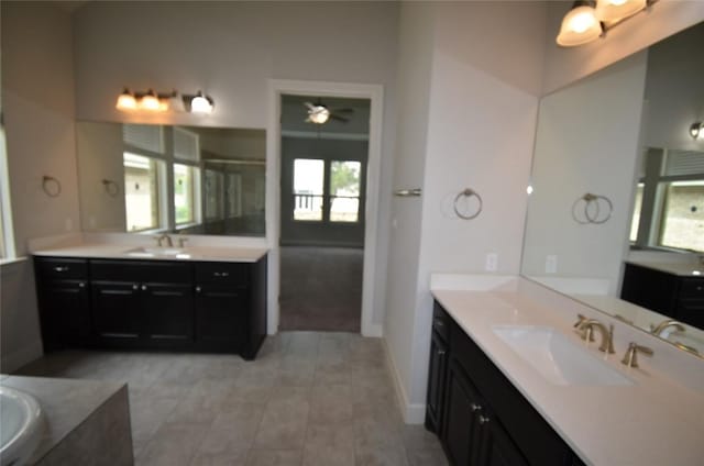 121 Bright Valley Way, Austin, TX 78737 - full bath with two vanities, healthy amount of natural light, and a shower with shower door