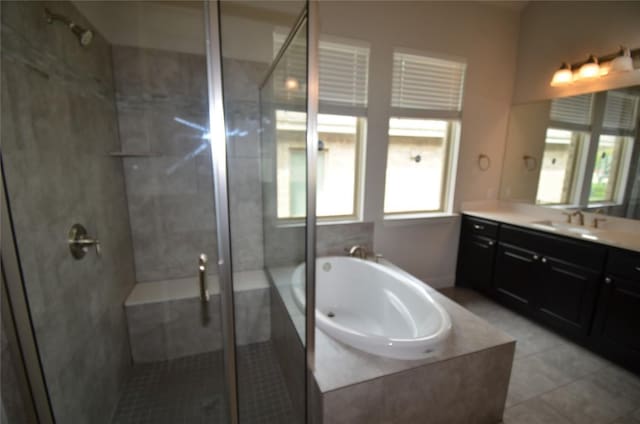 121 Bright Valley Way, Austin, TX 78737 - bathroom featuring a bath, vanity, a shower stall, and tile patterned flooring