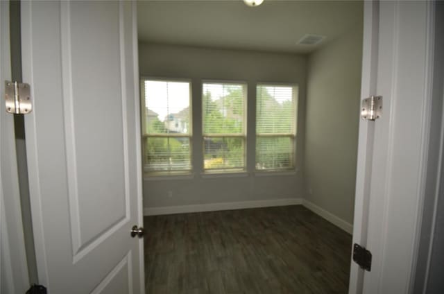 121 Bright Valley Way, Austin, TX 78737 - empty room featuring baseboards and dark wood finished floors