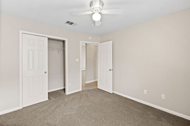 117 Kerley Dr, Hutto, TX 78634 - unfurnished bedroom featuring carpet, a closet, baseboards, and a ceiling fan