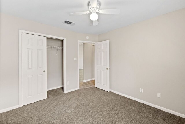 117 Kerley Dr, Hutto, TX 78634 - unfurnished bedroom featuring carpet floors, a closet, and a ceiling fan