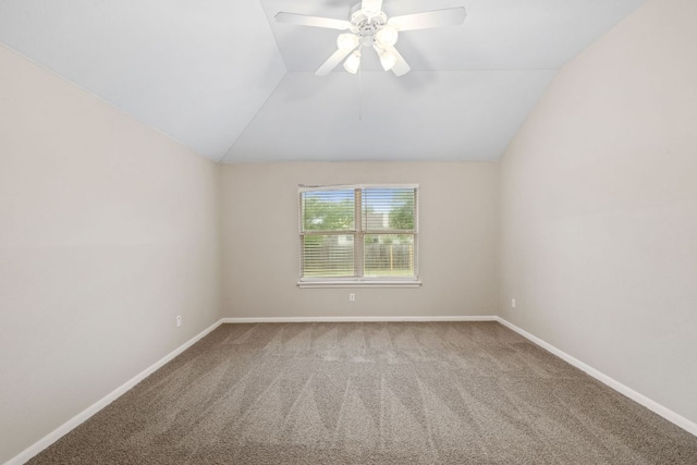 117 Kerley Dr, Hutto, TX 78634 - spare room featuring vaulted ceiling, carpet flooring, baseboards, and ceiling fan