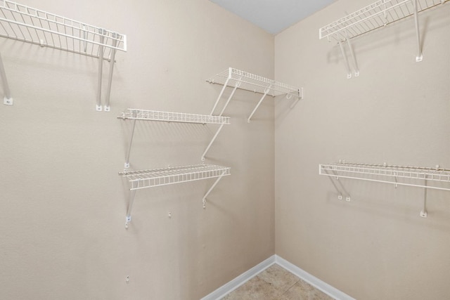 117 Kerley Dr, Hutto, TX 78634 - walk in closet with tile patterned floors