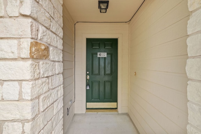 117 Kerley Dr, Hutto, TX 78634 - property entrance featuring stone siding
