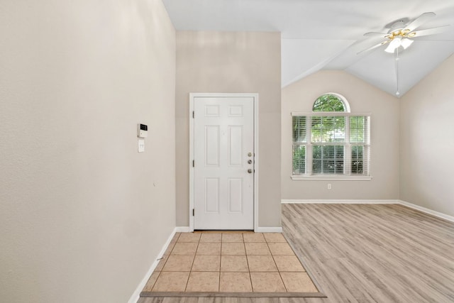 117 Kerley Dr, Hutto, TX 78634 - entryway featuring ceiling fan, lofted ceiling, baseboards, and light tile patterned floors