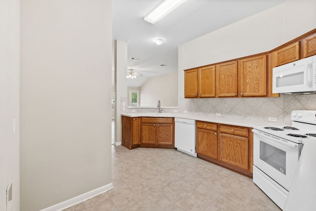 117 Kerley Dr, Hutto, TX 78634 - kitchen with white appliances, backsplash, brown cabinets, light countertops, and a ceiling fan