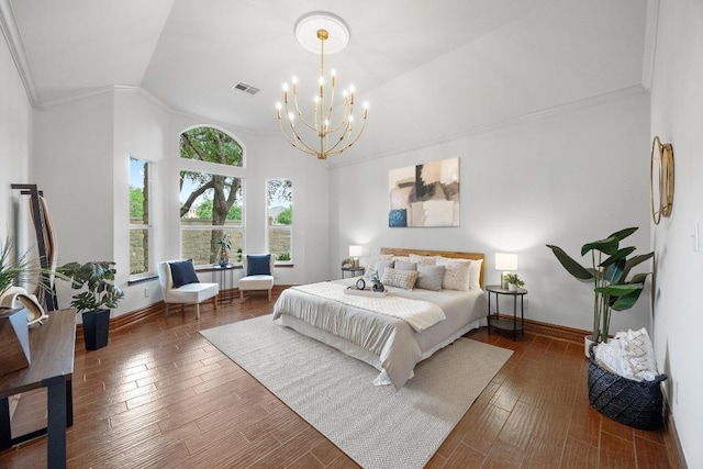 15901 Double Eagle Dr, Austin, TX 78717 - bedroom featuring a chandelier, ornamental molding, baseboards, vaulted ceiling, and wood finished floors