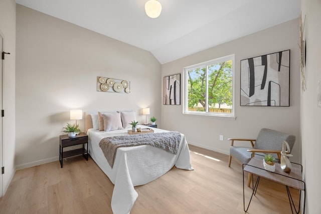 15901 Double Eagle Dr, Austin, TX 78717 - bedroom with light wood finished floors, baseboards, and lofted ceiling