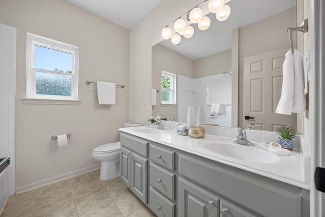 15901 Double Eagle Dr, Austin, TX 78717 - bathroom with double vanity, a tile shower, baseboards, toilet, and tile patterned floors