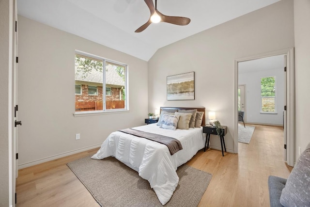 15901 Double Eagle Dr, Austin, TX 78717 - bedroom featuring light wood finished floors, lofted ceiling, baseboards, and ceiling fan
